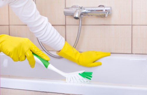 Cleaning the exterior front of a property in E8 with careful access planning